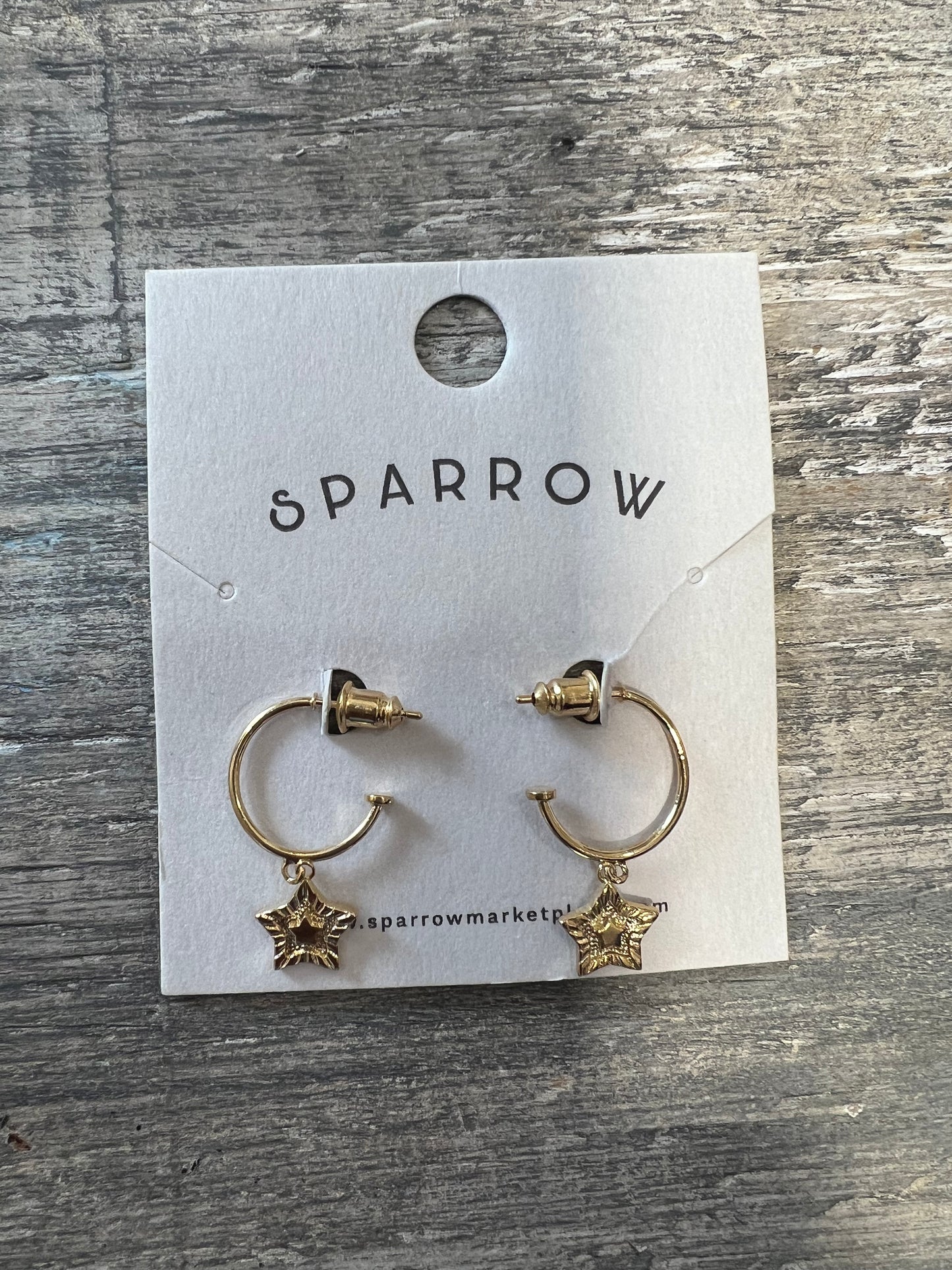 Gold star detailed earrings